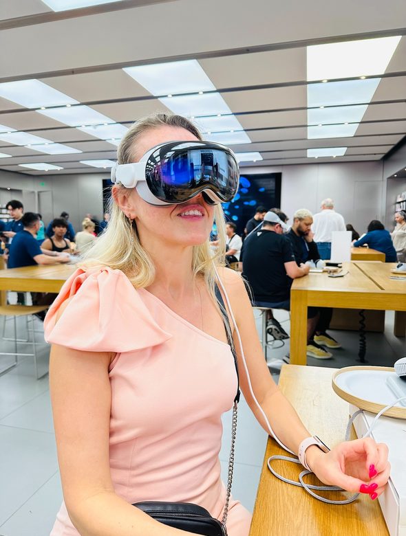 Maria trying a VR headset